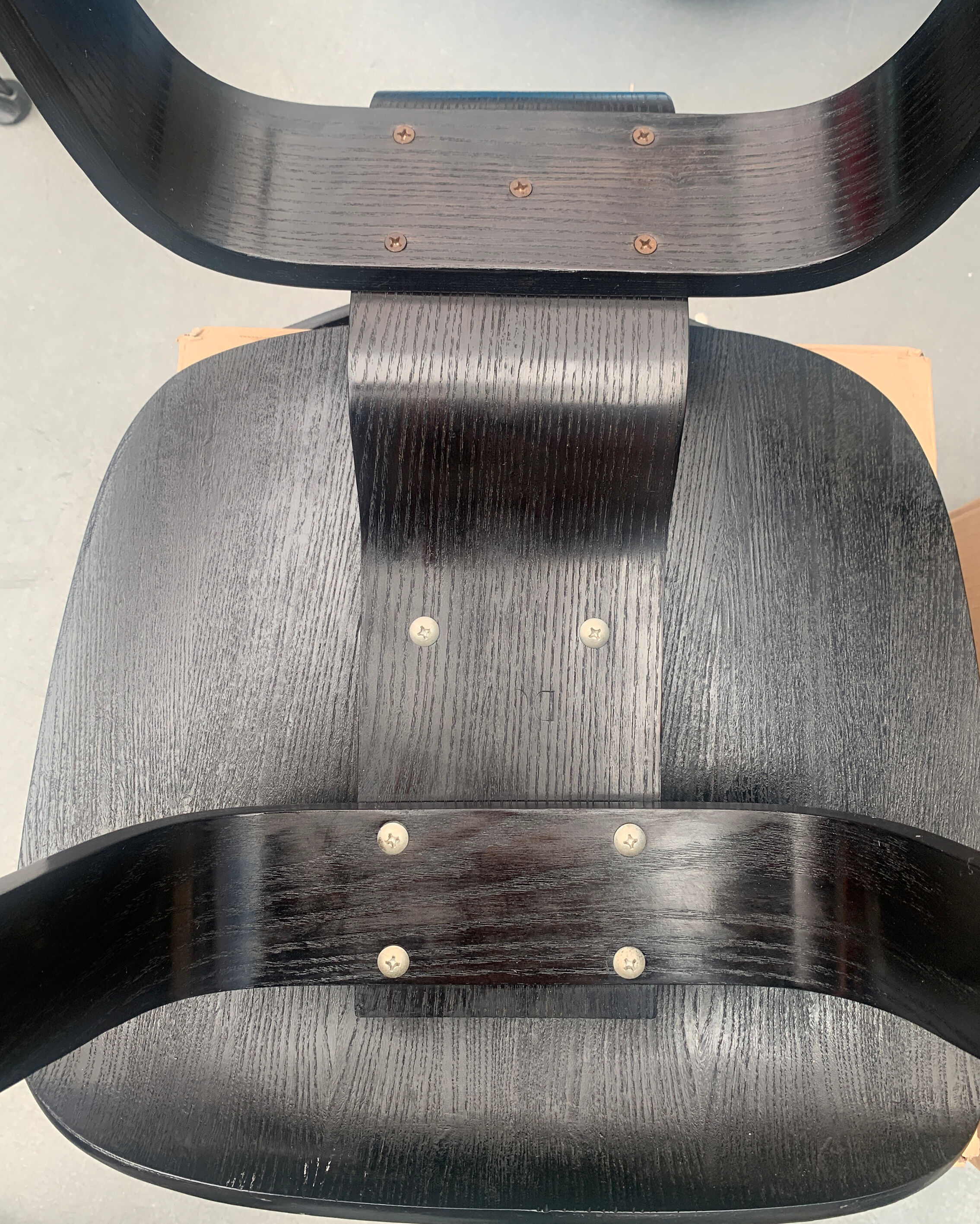 Pair of DCW chairs by Charles & Ray Eames in Black for Herman Miller 1950
