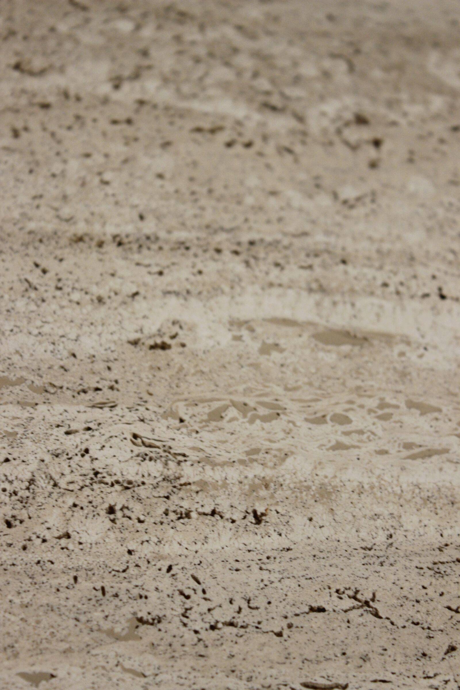 Low design side table in travertine, 1970s