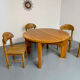 Extendable round table Maison Regain in solid elm, 1970s design.