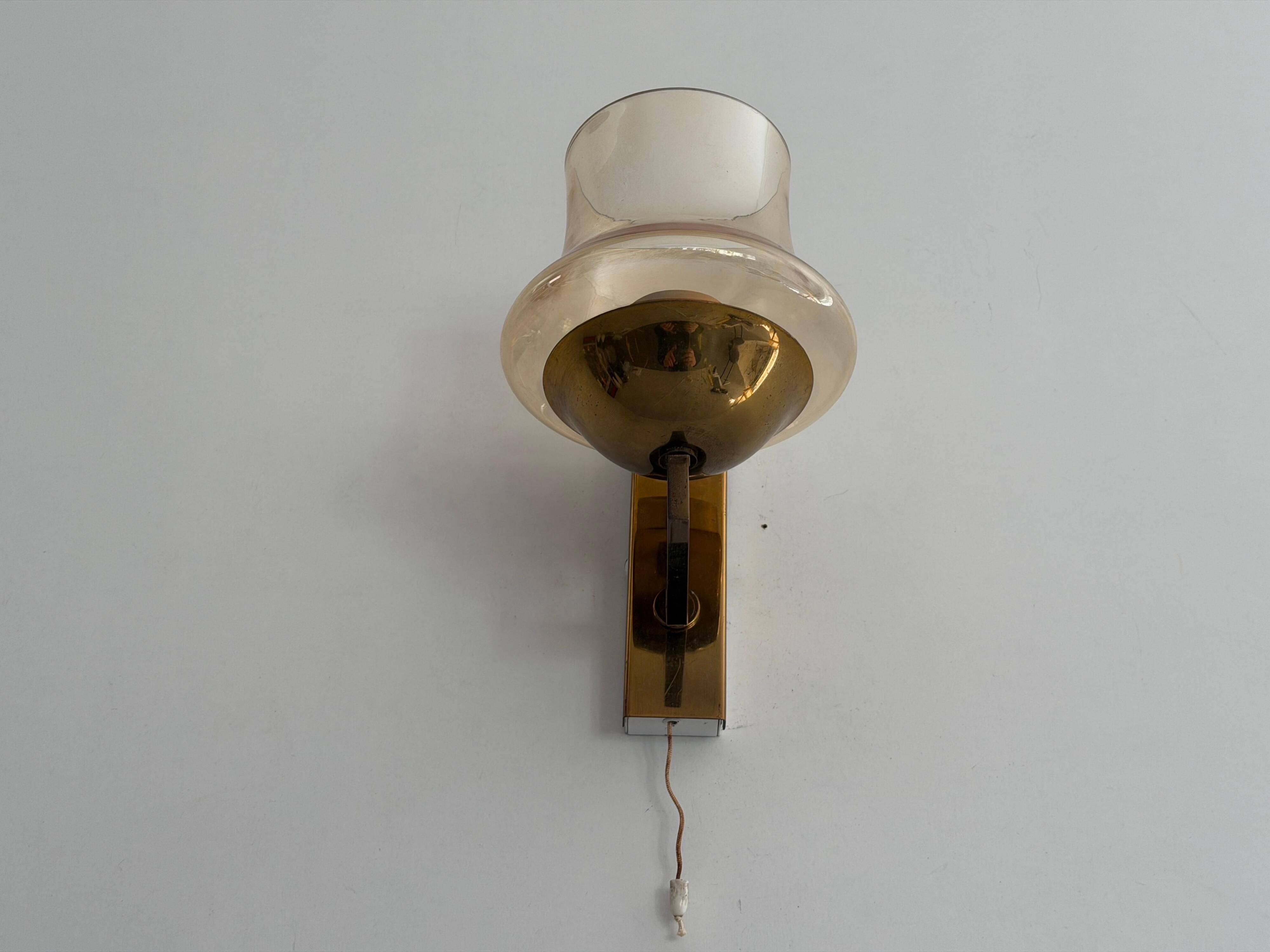 Yellow glass and brass wall light from the mid-century, 1960, Germany.