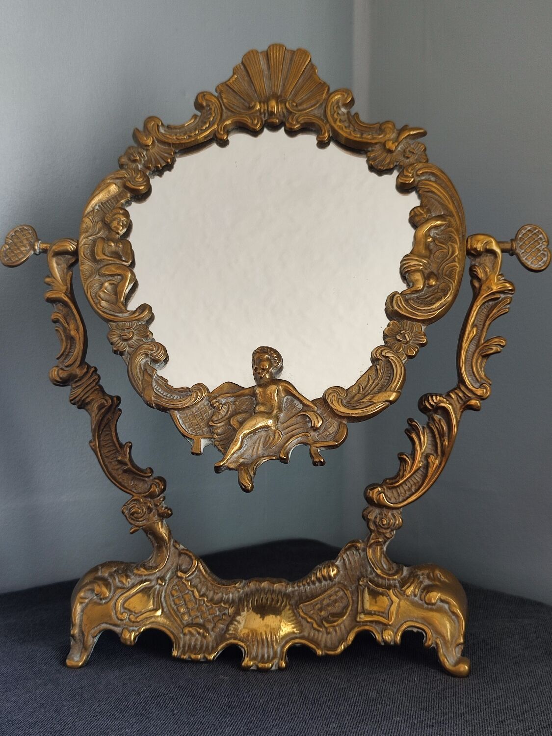 Ancient mirror psyche in bronze