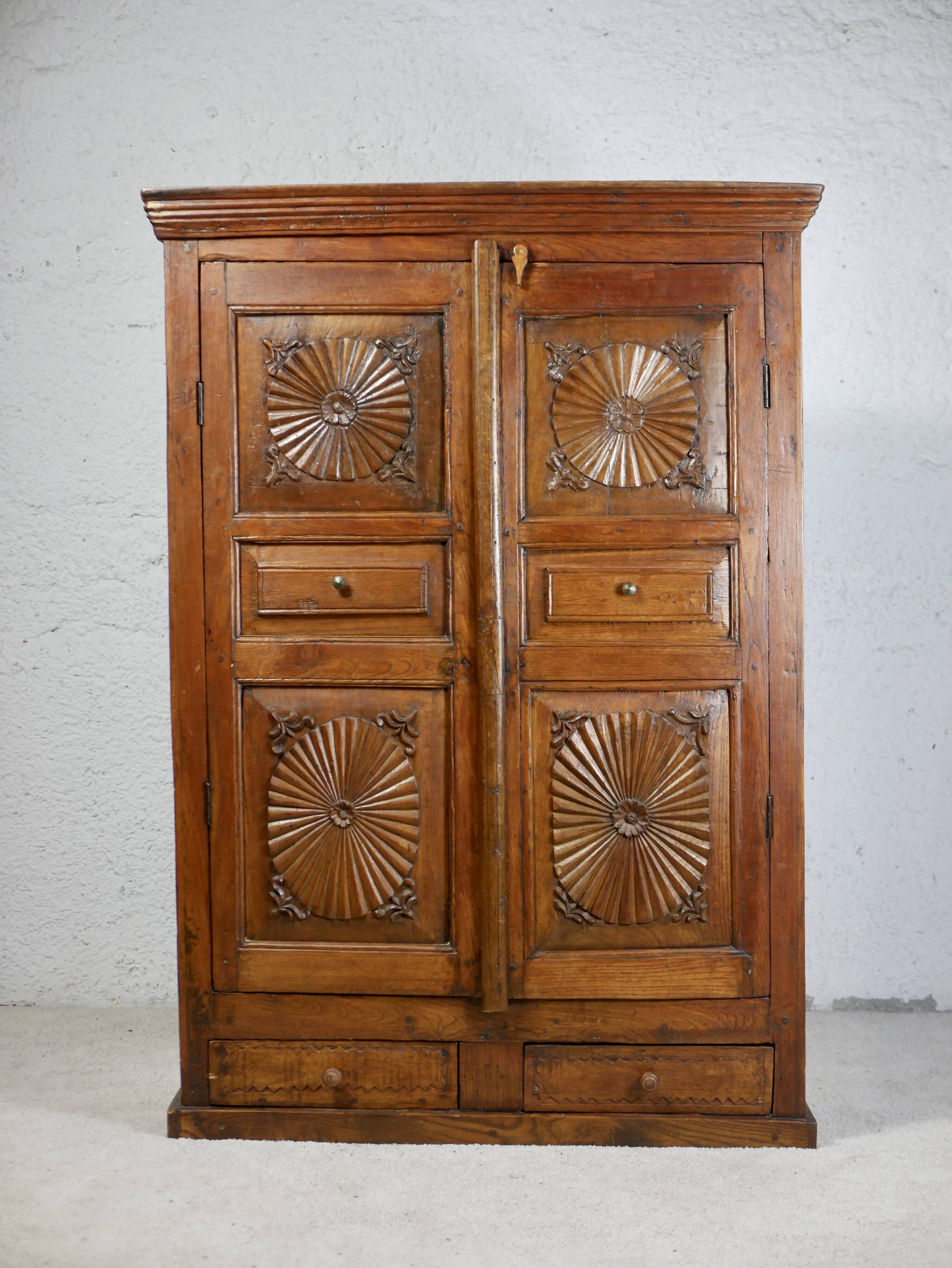 Antique carved wooden cabinet