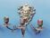 Paire d'appliques  bougeoirs en bronze