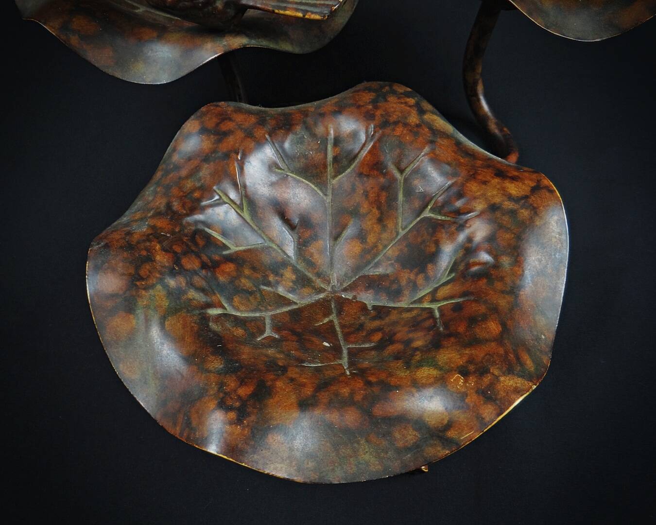 Three-tiered lotus leaf shaped patinated metal bird bath