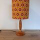 Mid-century wooden table lamp, retro-pop saffron print