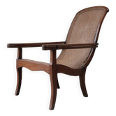 Lounge Chair with Cane Seat and Swing-Out Armrests