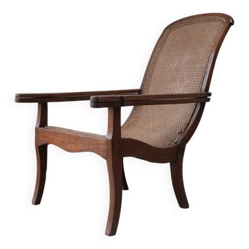 Lounge Chair with Cane Seat and Swing-Out Armrests