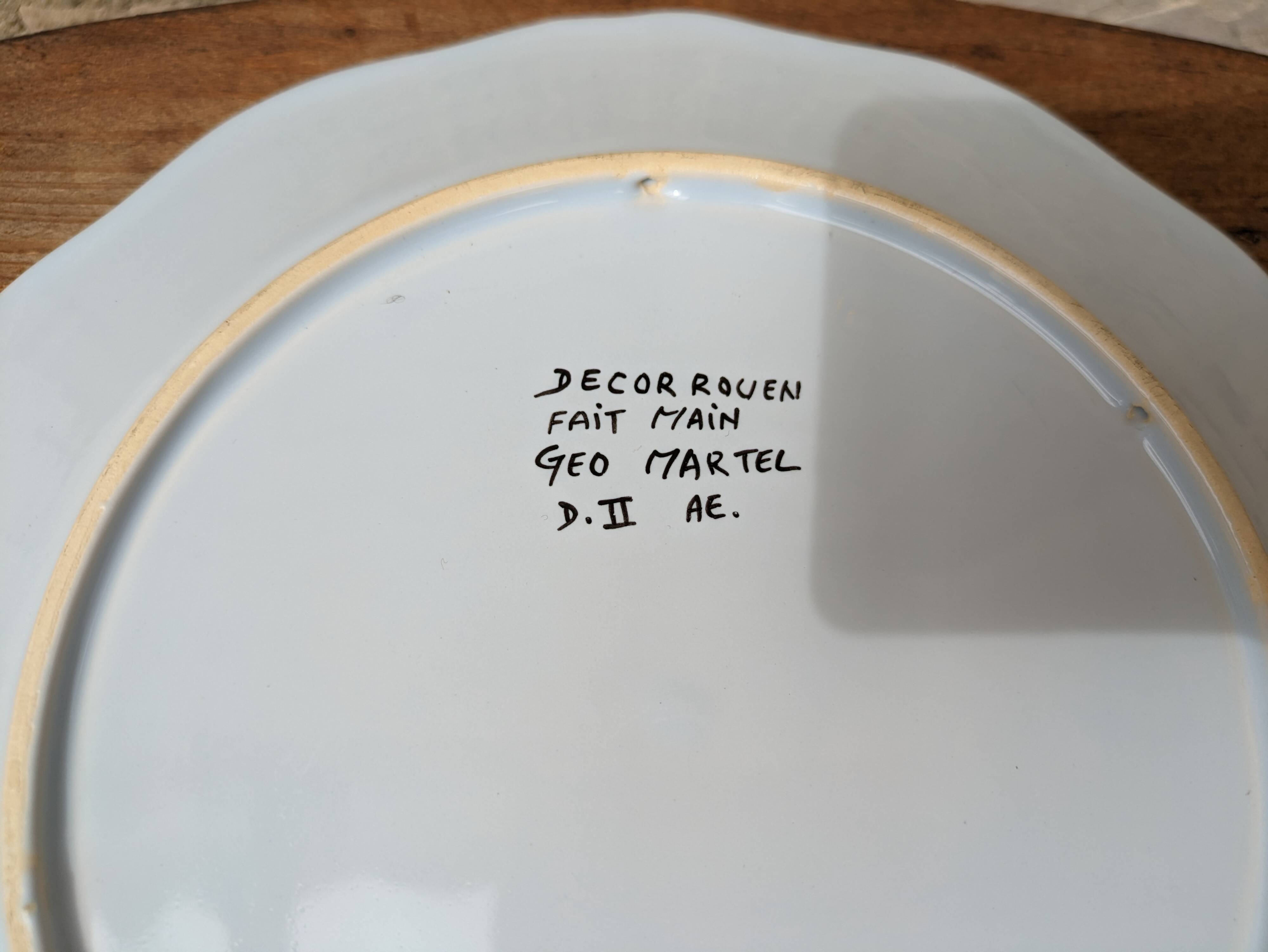 Very beautiful old plate decorated with Rouen, handmade by Geo Martel