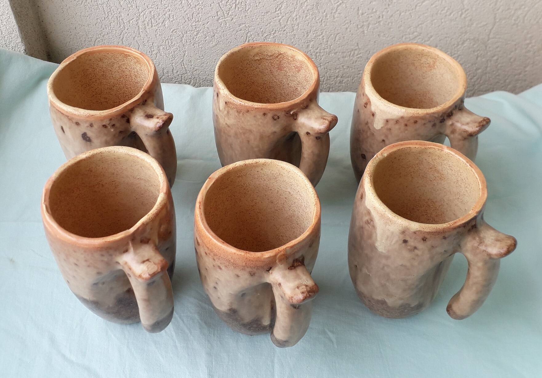 6 ceramic mugs or tankards