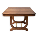 Art Deco extendable table in solid wood and brass.