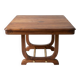 Art Deco extendable table in solid wood and brass.