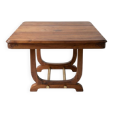 Art Deco extendable table in solid wood and brass.