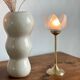 Pair of tulip-shaped candle holders in frosted glass and brass.