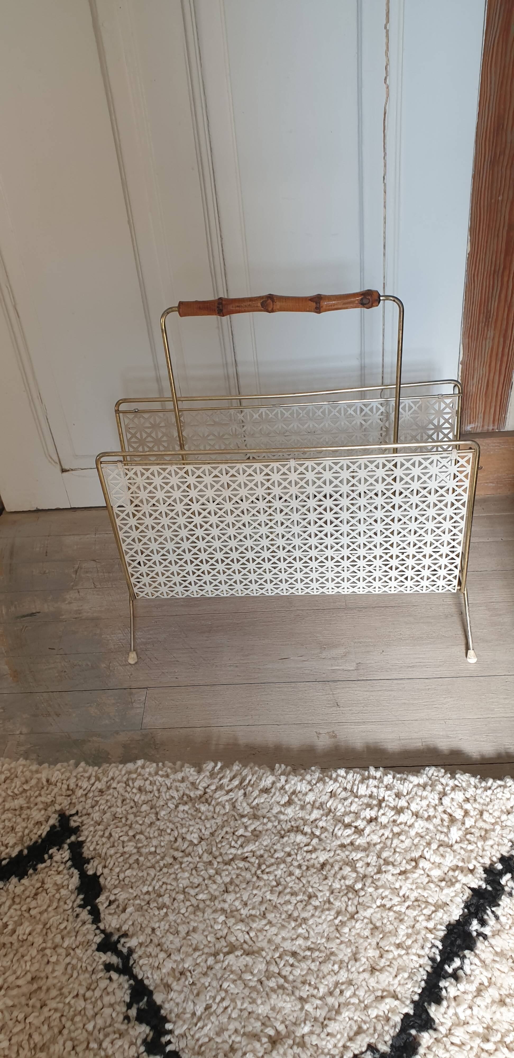 Perforated metal review door