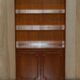Open library Bradley Furniture made of yew wood with a cupboard base.