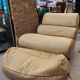 Armchair and footrest Comgule Roche Bobois leather