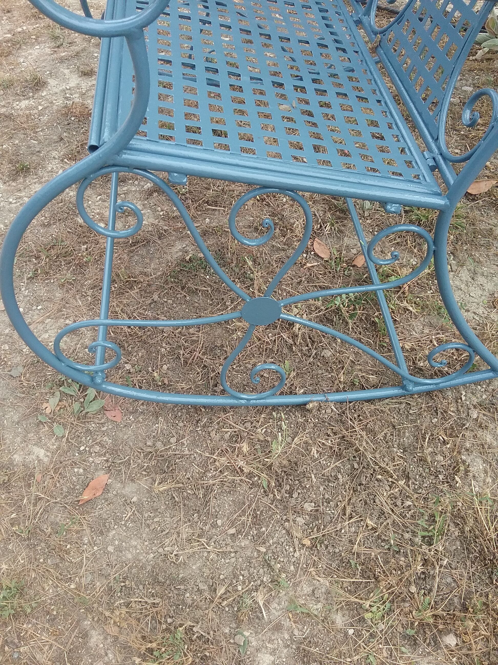Large wrought iron rocking chair