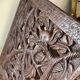 Chaise vintage à palabre en bois sculpté
