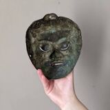 Ancient Indonesian bronze mask antique ethnic decoration tribal theater