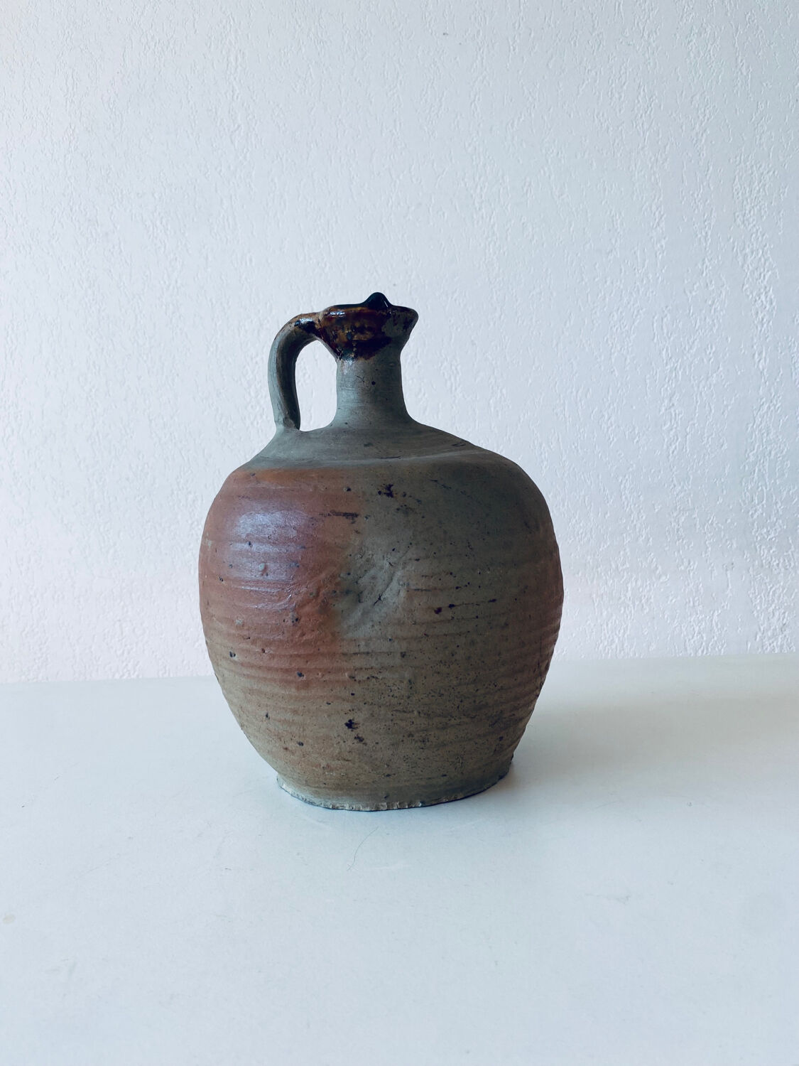 Antique terracotta jug