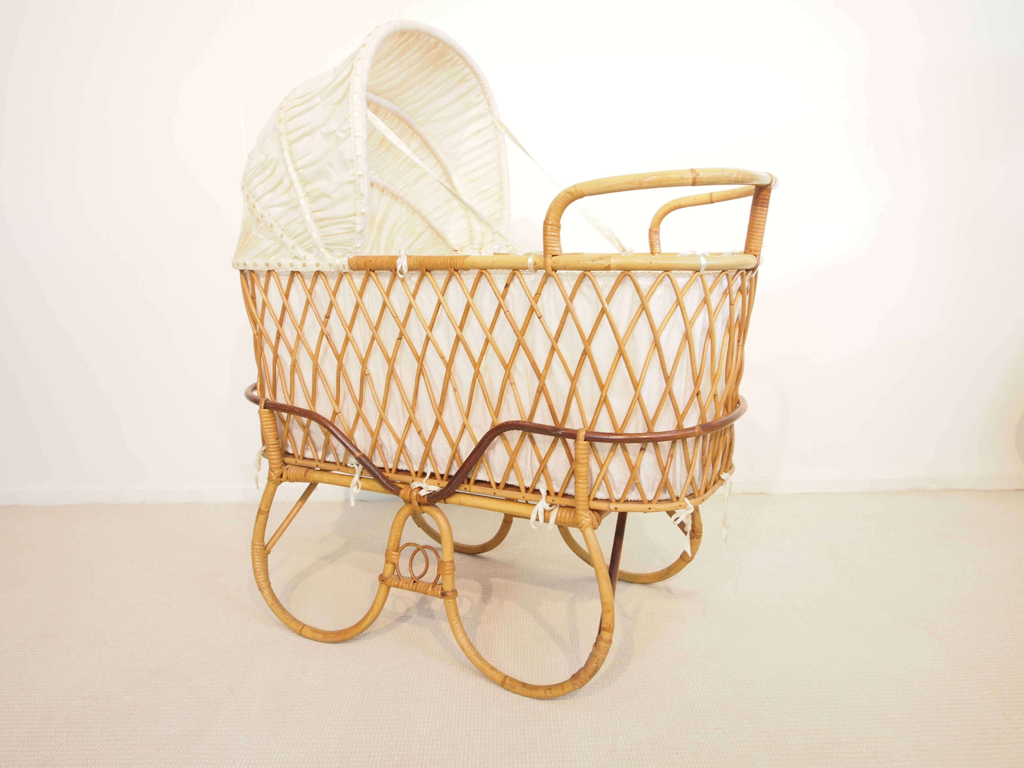 Vintage mid century rattan cradle
