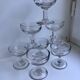 set of 9 small molded glass shot glasses early twentieth century