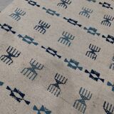 White and blue rug with Berber patterns, hand-woven in natural wool