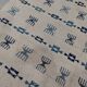 White and blue rug with Berber patterns, hand-woven in natural wool