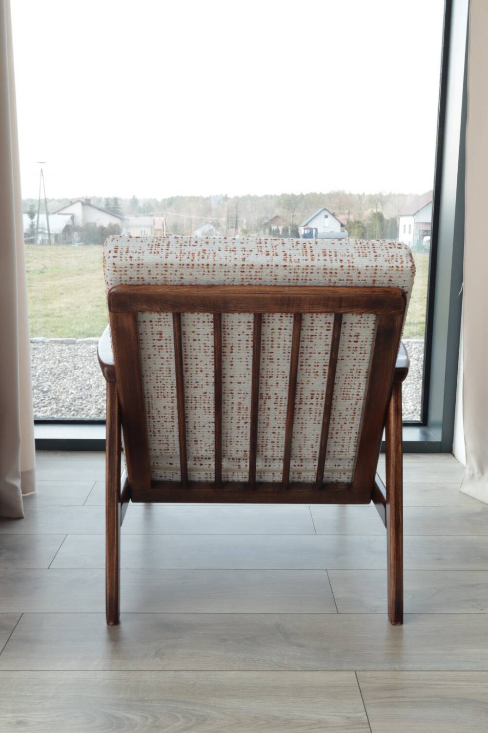 Vintage Danish boucle armchair with orange polka dots from the 1960s.