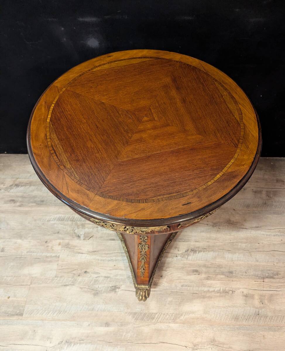 Circular gueridon in marquetry and bronze, Empire style
