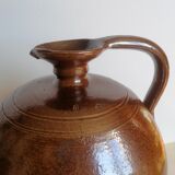 Ancient enamelled sandstone jug