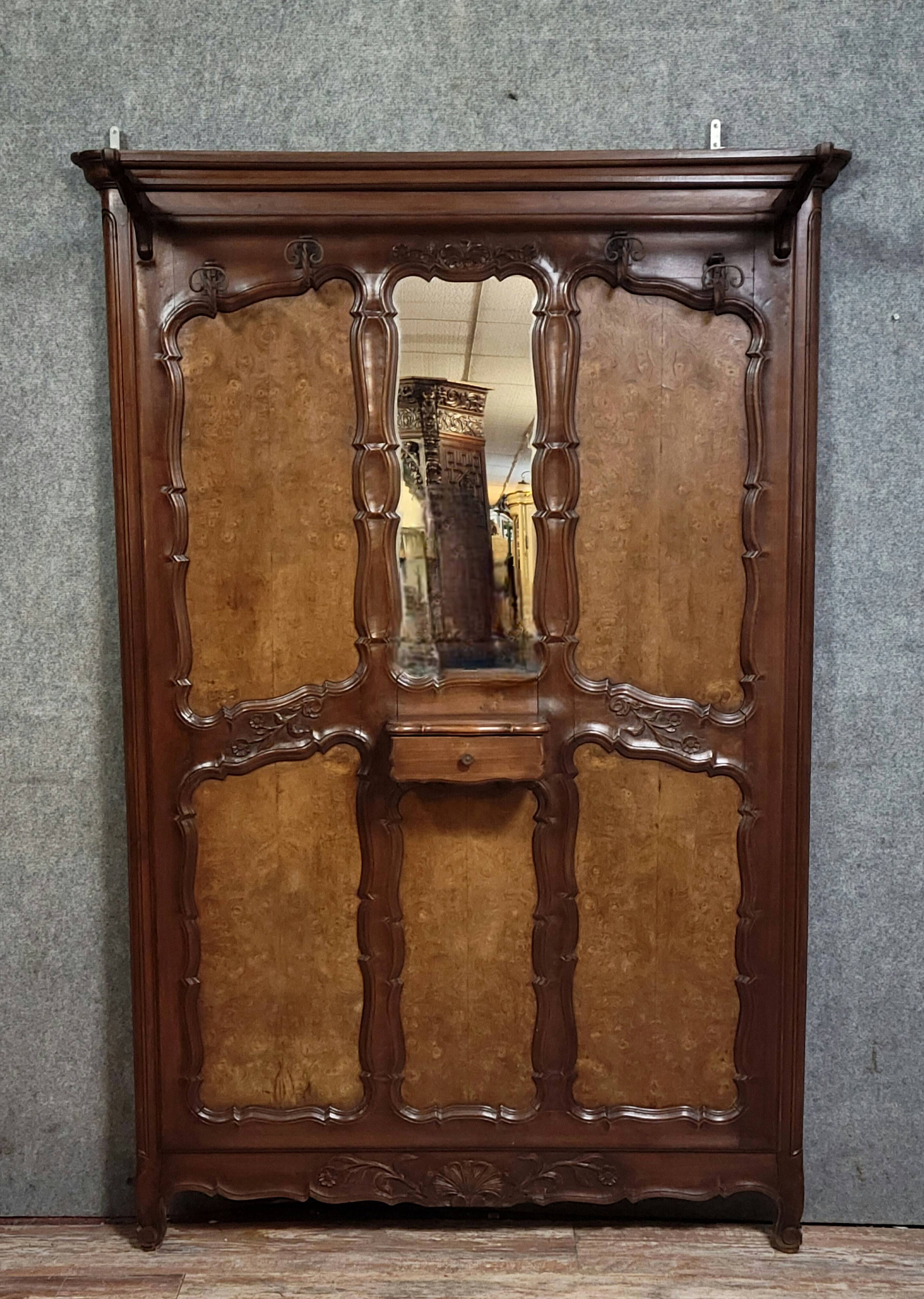 Large coat rack in Louis XV style, made of walnut and elm burl.