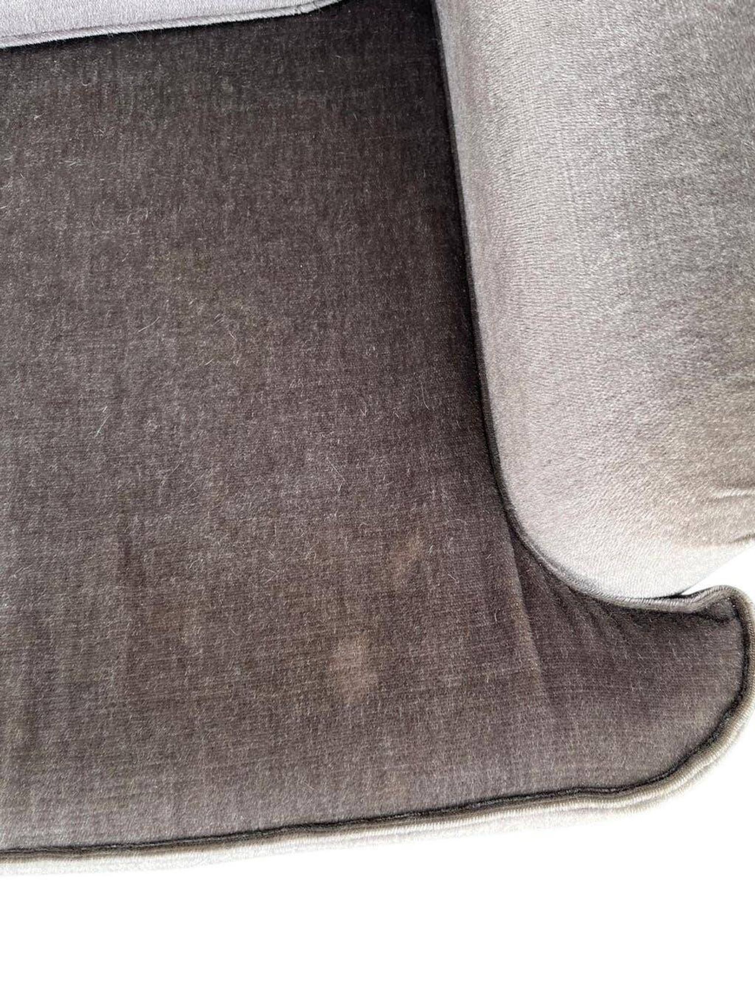 Vintage taupe two-seater armchair/sofa with fringes.