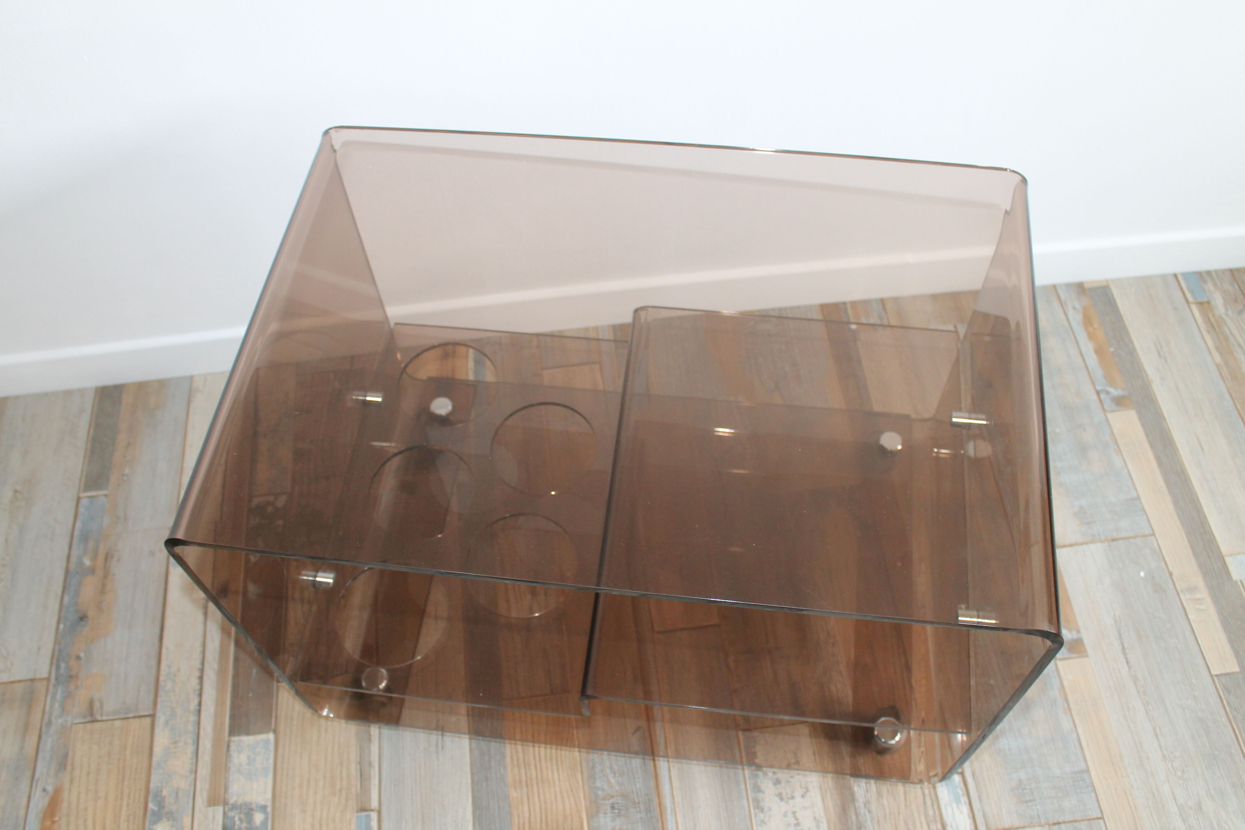 Low table served on wheels by Michel Dumas in vintage 1970 smoky Plexiglas