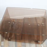 Table basse desserte sur roulettes par Michel Dumas en plexiglas fumé vintage 1970