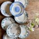 Set of 8 mismatched antique ironstone deep plates.