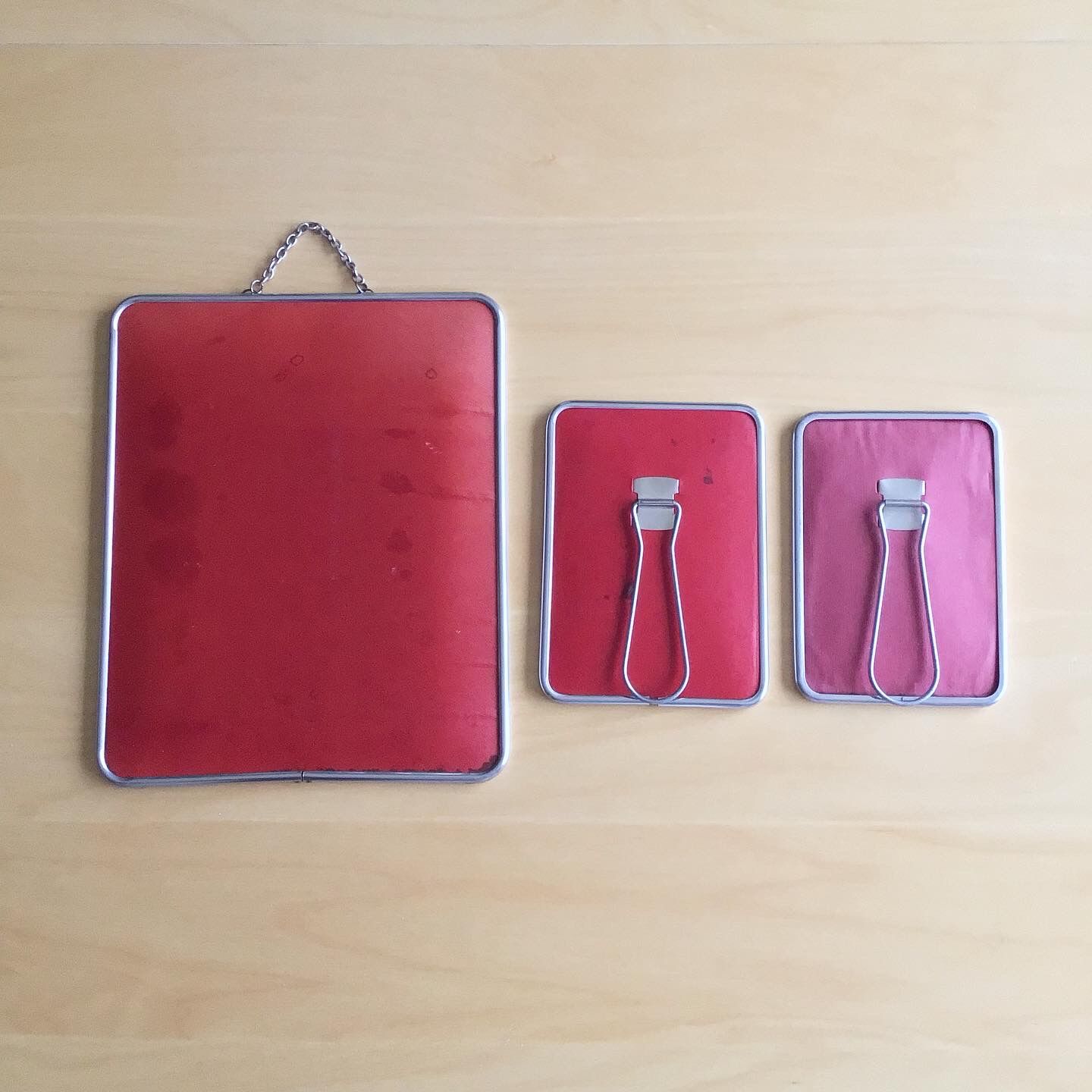 Set of three vintage barber mirrors