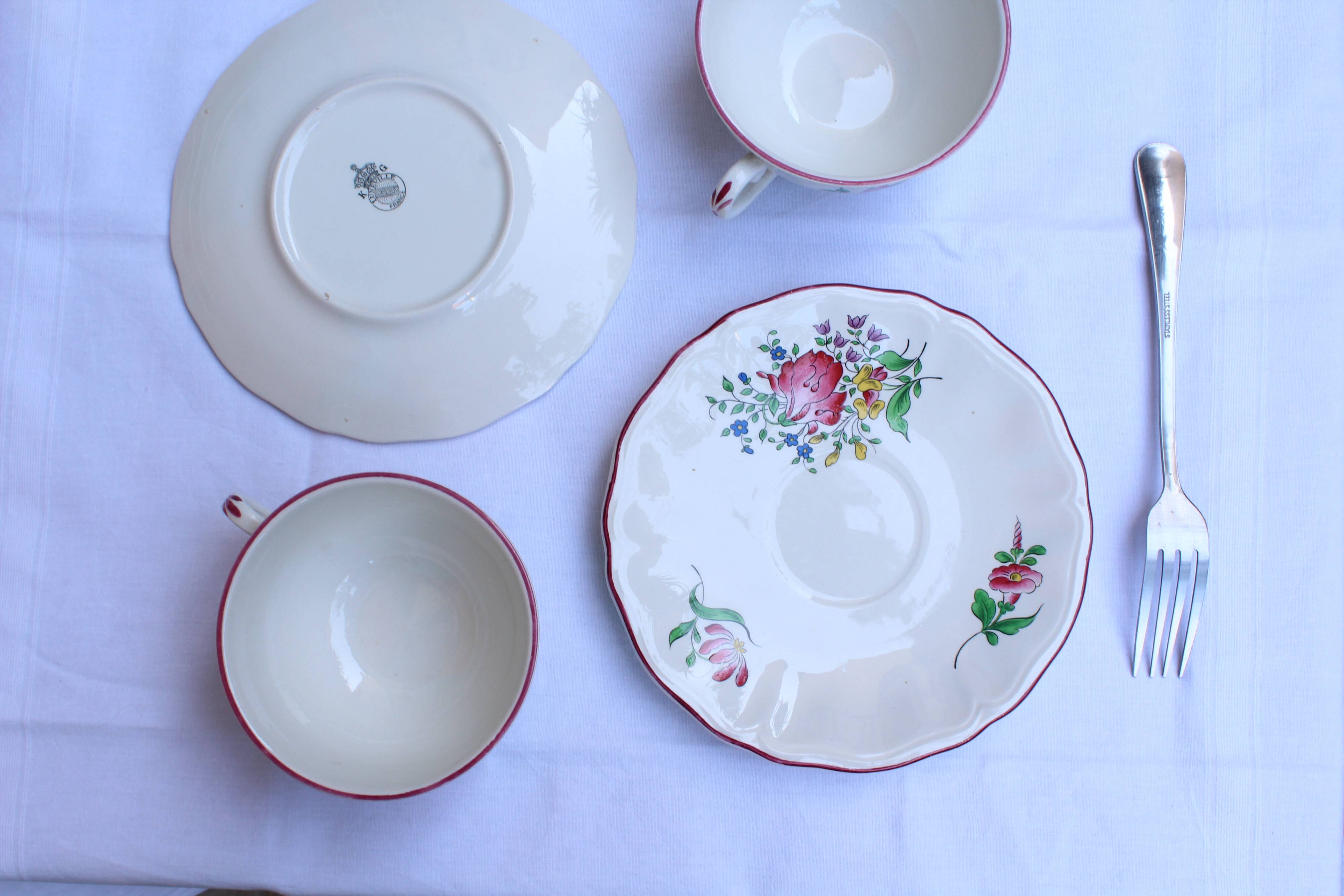 Lunéville earthenware cups and saucers