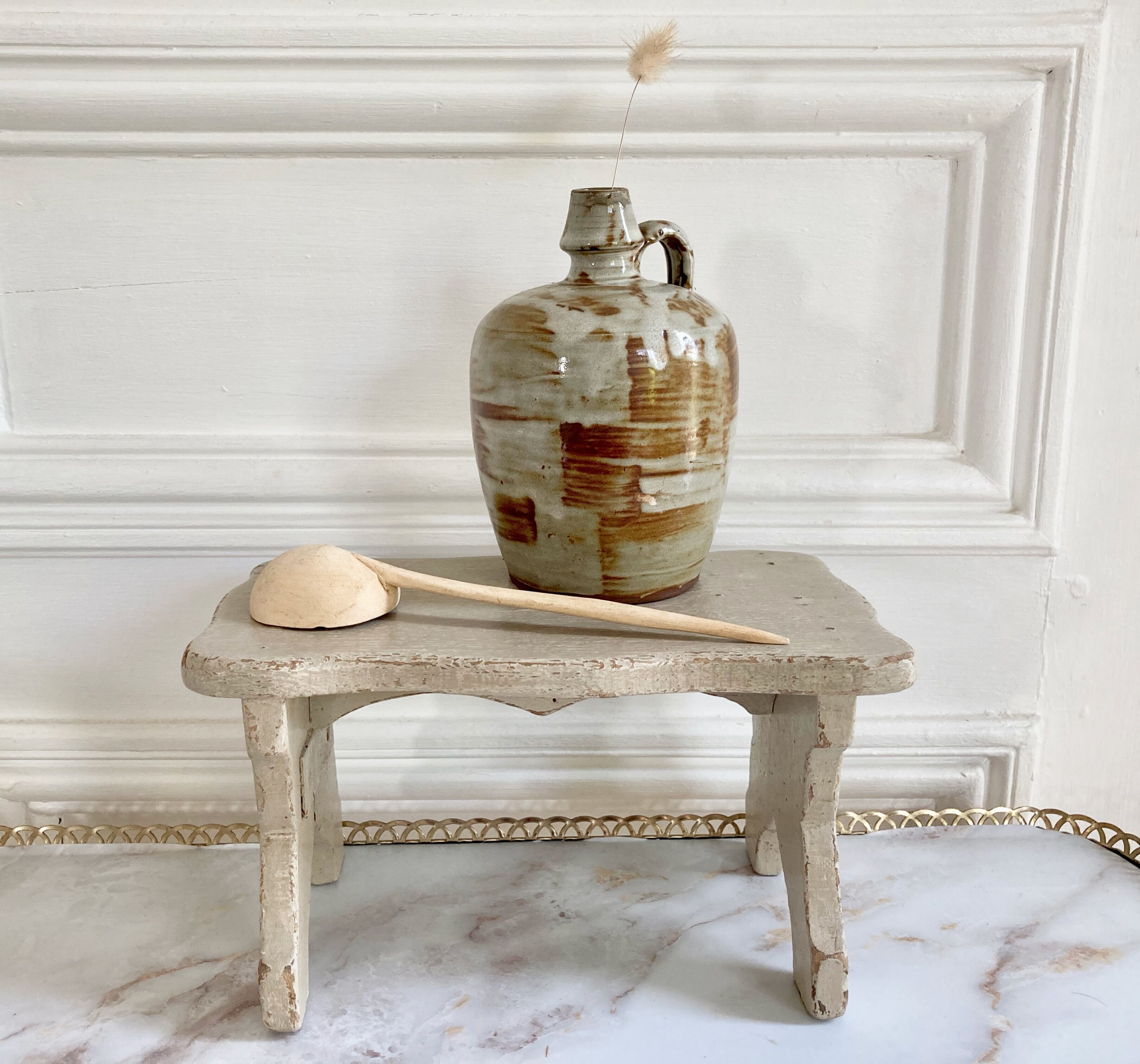 Set of three glazed ceramic pitchers