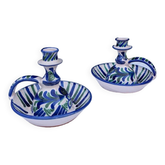 2 ceramic candle holders with blue green patterns