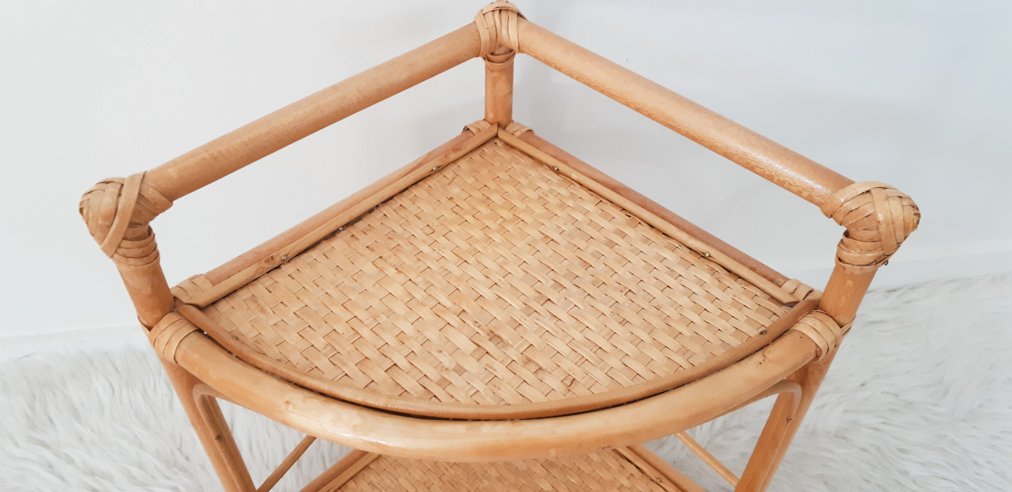 Rattan corner shelf