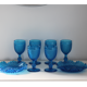 Old table set in blue pressed moulded glass