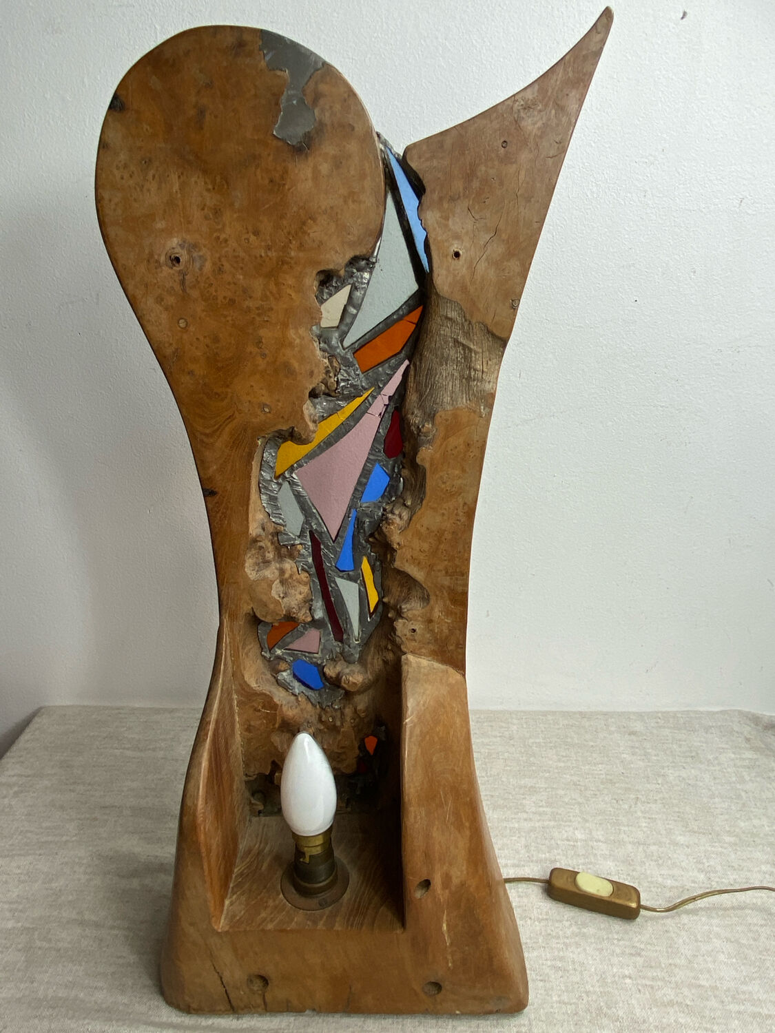 Carved wooden lamp and stained glass