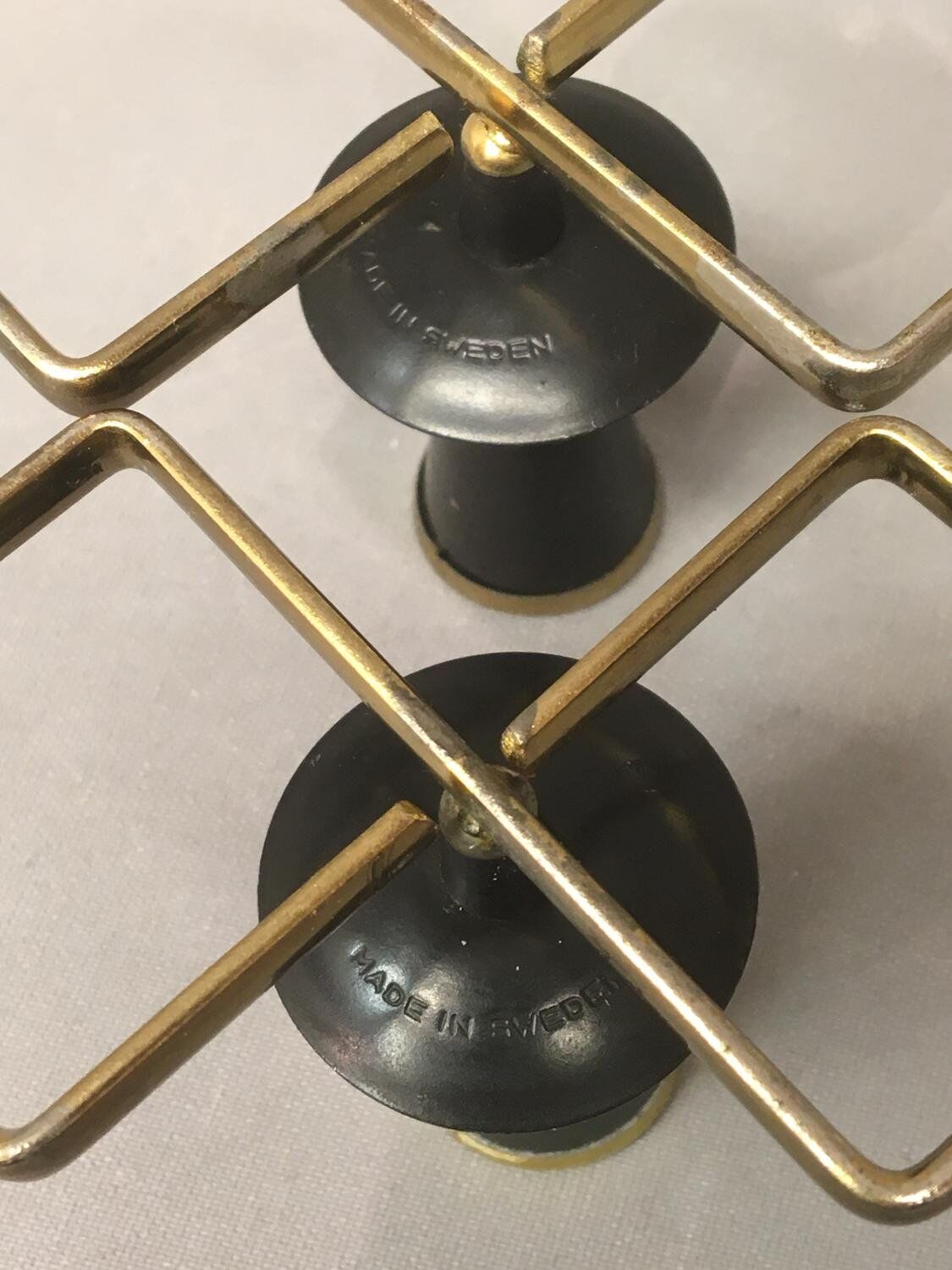 Pair of vintage candle holders in black metal and brass Sweden 1960