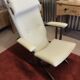 Rocking lounge chair made of fabric suitable for outdoor use.