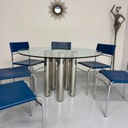 Round glass and metal dining table, Italian design from the 80s, vintage