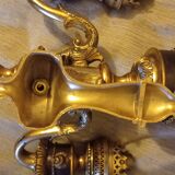 Wall light with lights and lion heads
