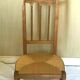 Pray god in massive cherry tree, 20th century straw bottom Prayer chair