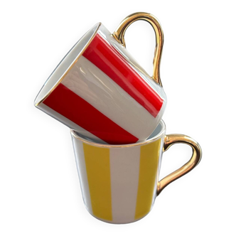 Pair of red and yellow striped cups