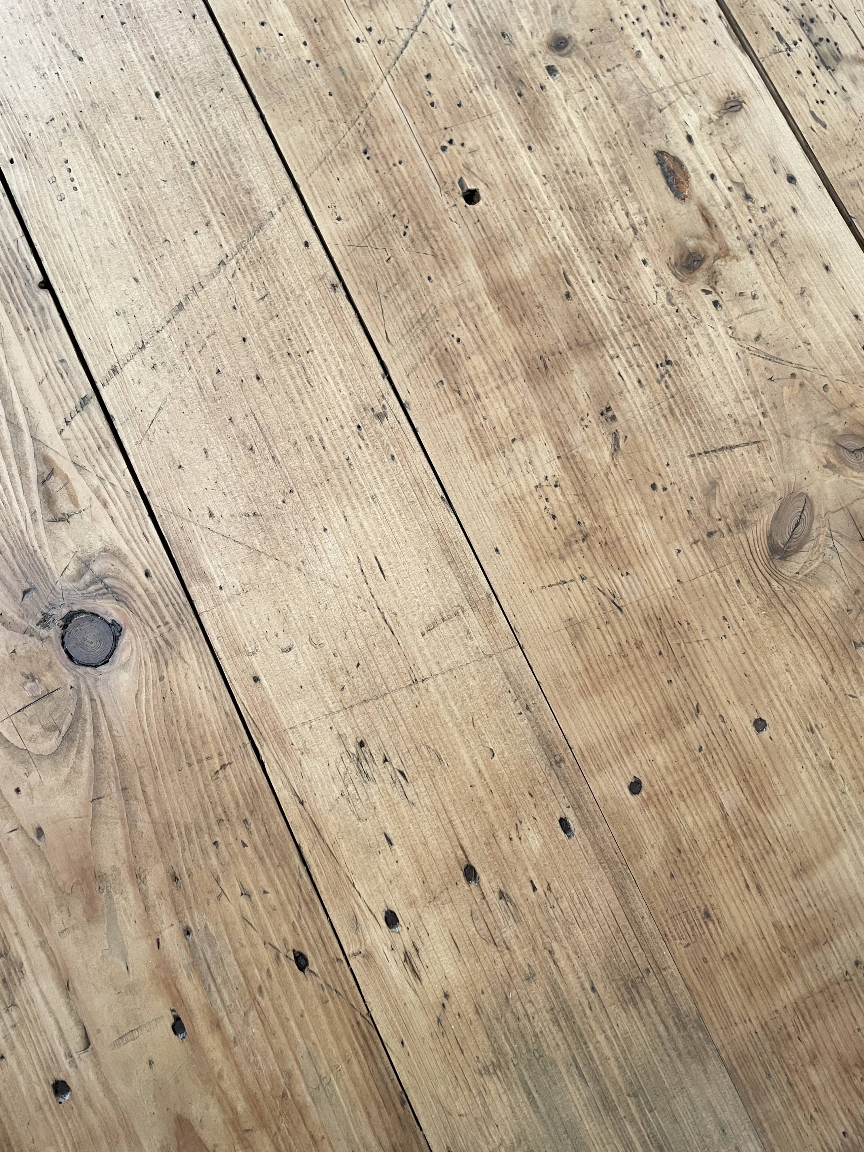 Solid wood workshop table with straight legs.